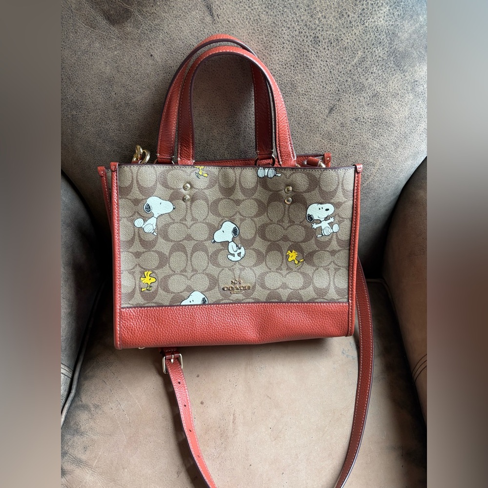 Coach x Peanuts Dempsey Carryall In Signature Canvas With Snoopy Woodstock Print